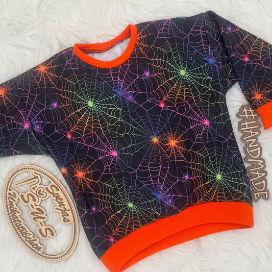 Neon Halloween Spinnennetz Stoff Meterware Detailaufnahme – Jersey French Terry