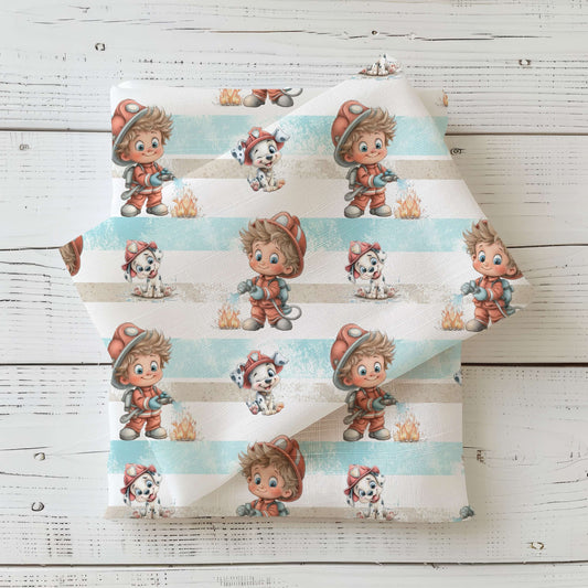 Kinderstoff „Kleine Feuerwehrhelden“ mit Junge & Hund. Erhältlich als Jersey, Rib & French Terry – jetzt entdecken & kleine Helden-Outfits nähen!