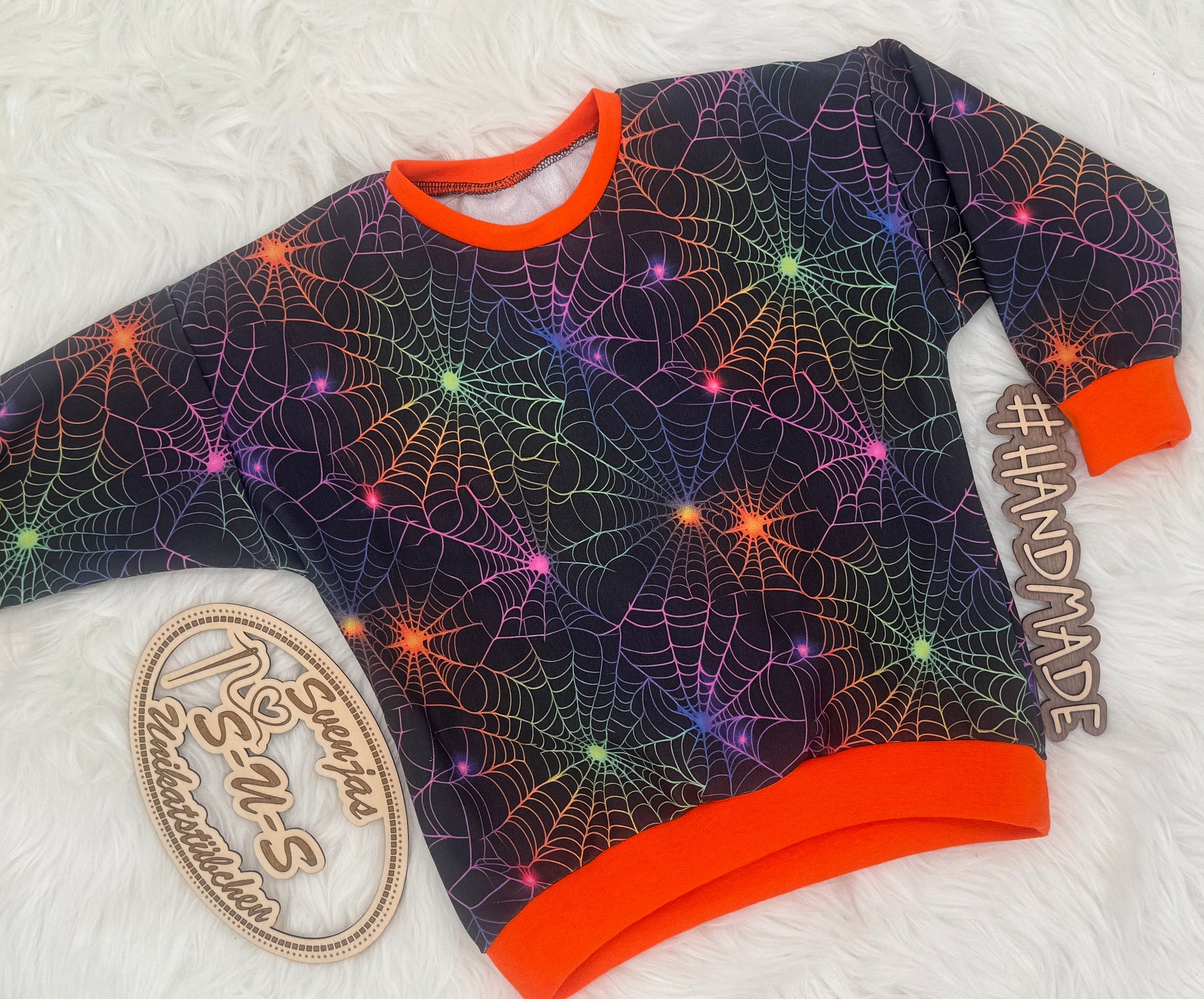 Neon Halloween Spinnennetz Stoff Meterware Detailaufnahme – Jersey French Terry