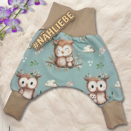 Eulen Stoff Meterware mint Detailaufnahme – Kinderstoff Jersey Nähprojekt