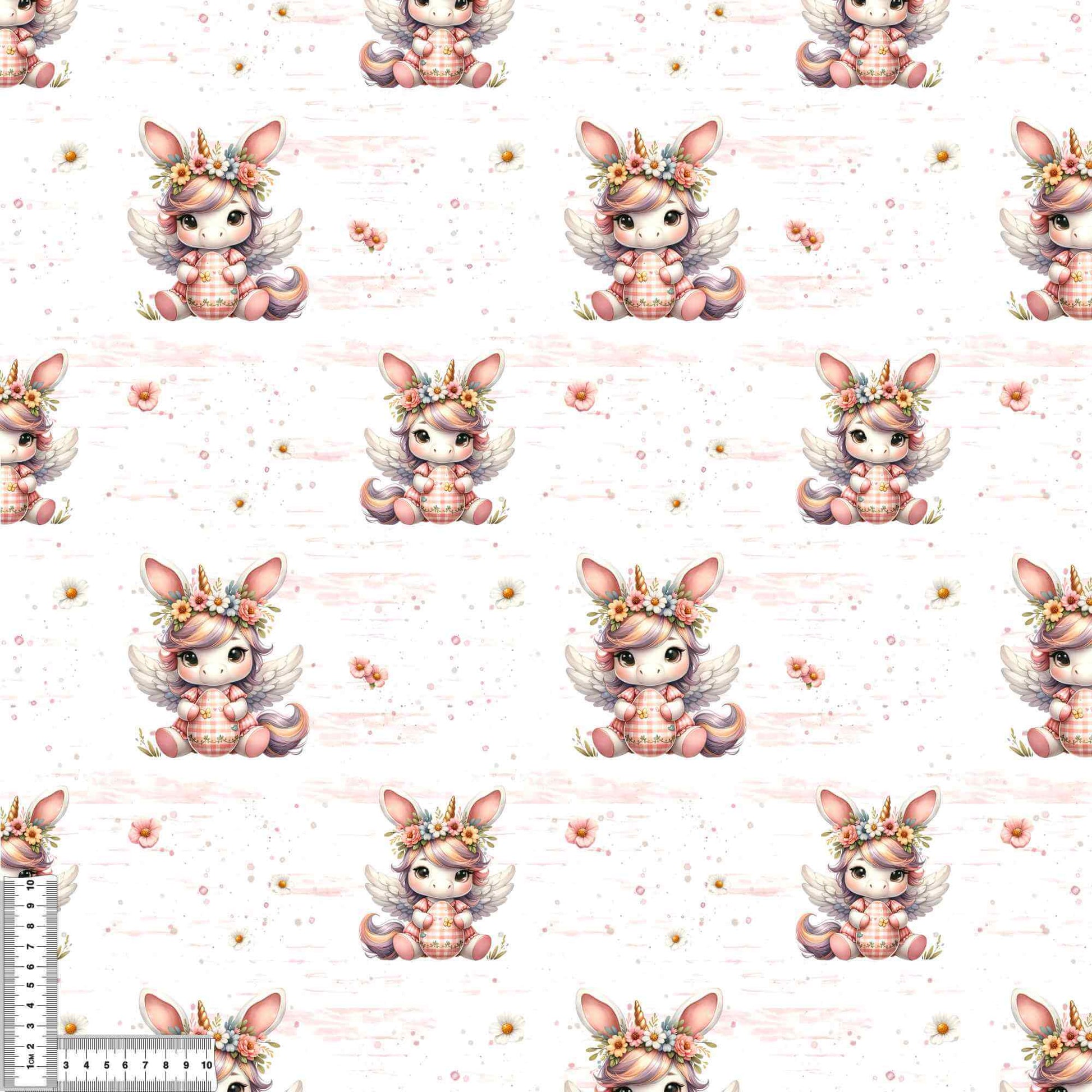 Detailaufnahme vom Verspielter Bio Jersey Osterstoff mit Oster Einhorn und floralen Details auf hellem Hintergrund, perfekt für kreative Nähprojekte